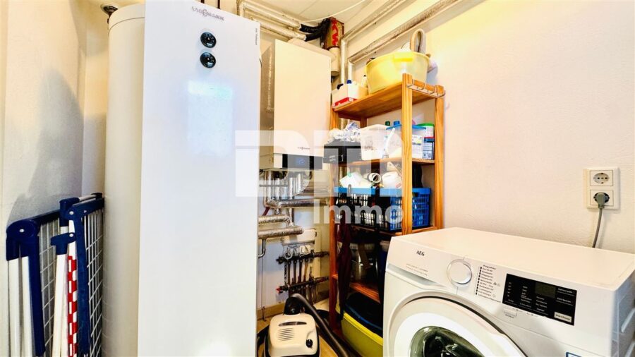 Modernes Familienglück nahe KfW 55-Standard mit Terrasse, Carport und Parkplatz - EG HWR / Technik